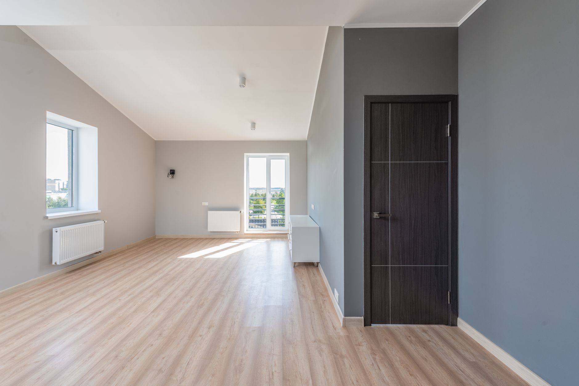 Plancher chauffant basse température et pompe à chaleur dans une maison rénovée