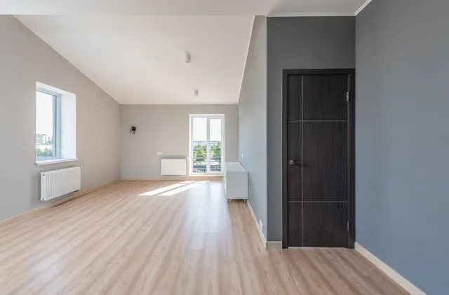 Plancher chauffant basse température et pompe à chaleur dans une maison rénovée